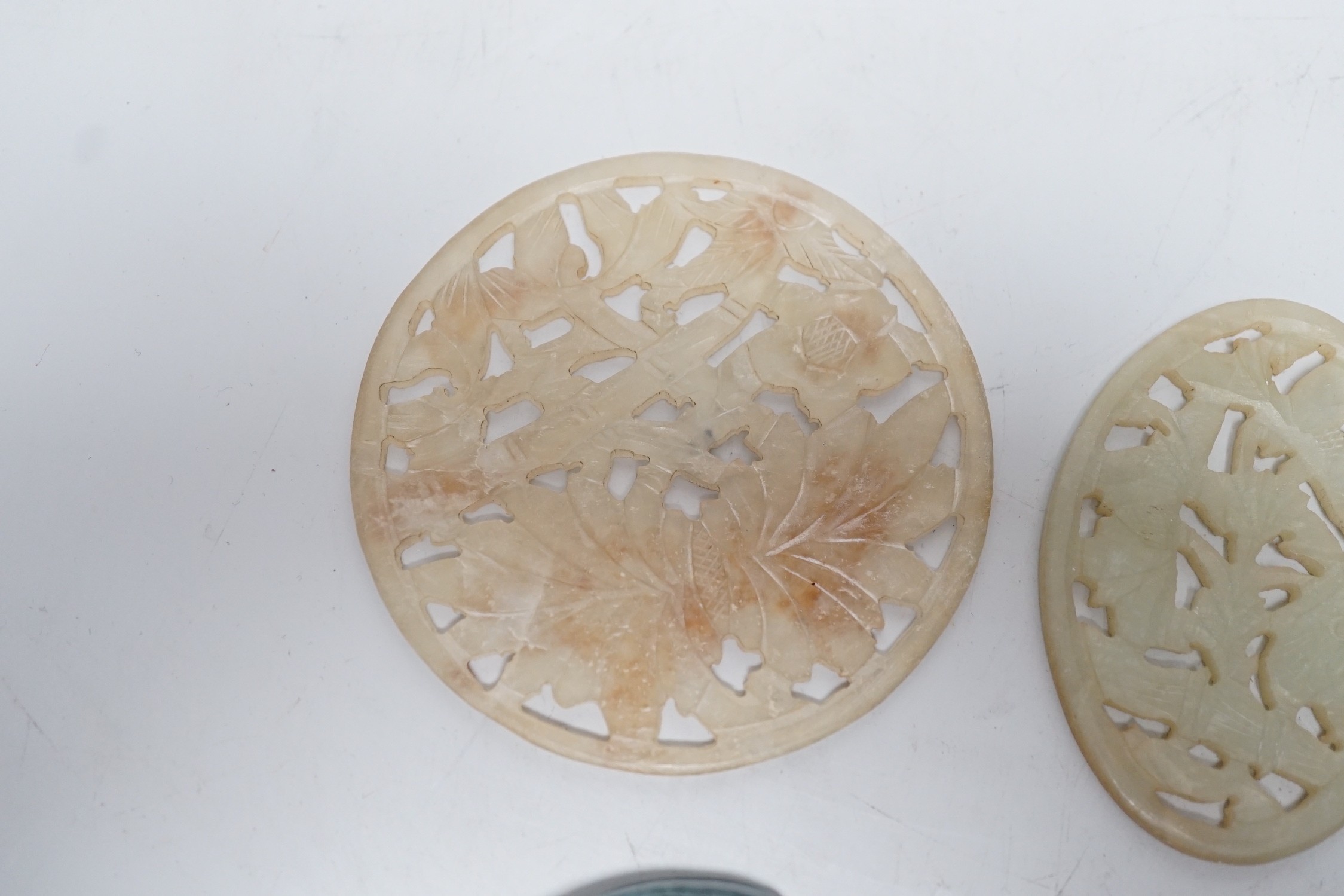 Two Chinese jadeite carvings, two pierce hardstone plaques and a malachite carving (5)